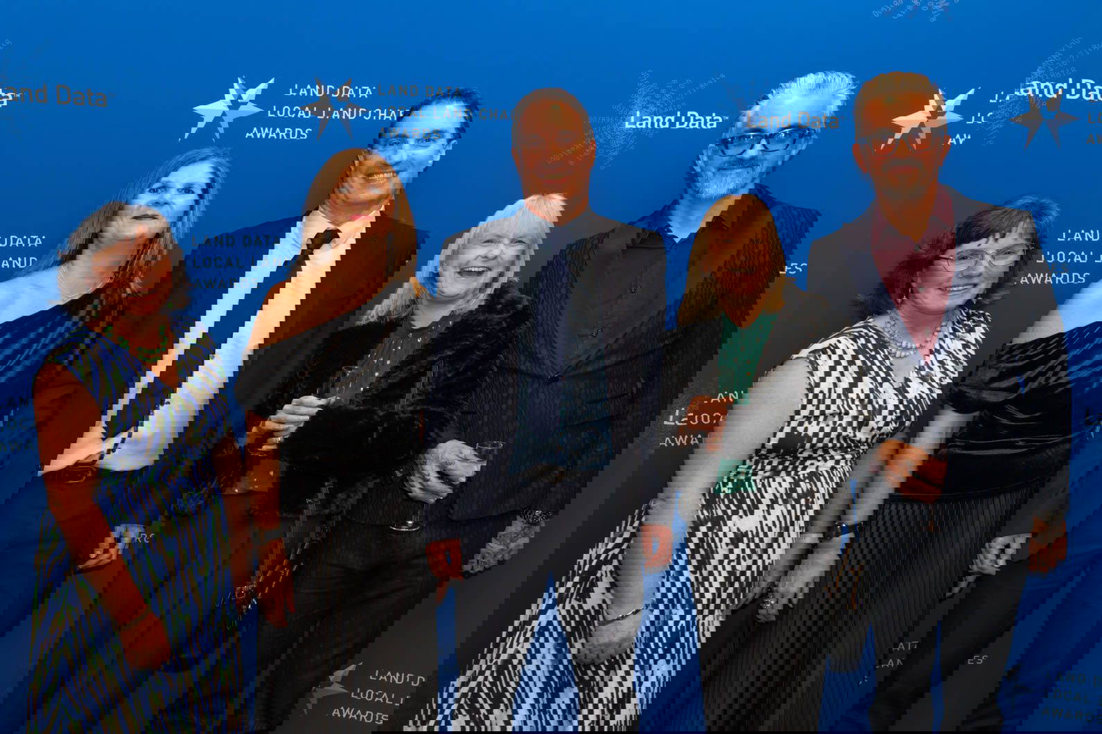 Group photo of award winners at corporate awards evening