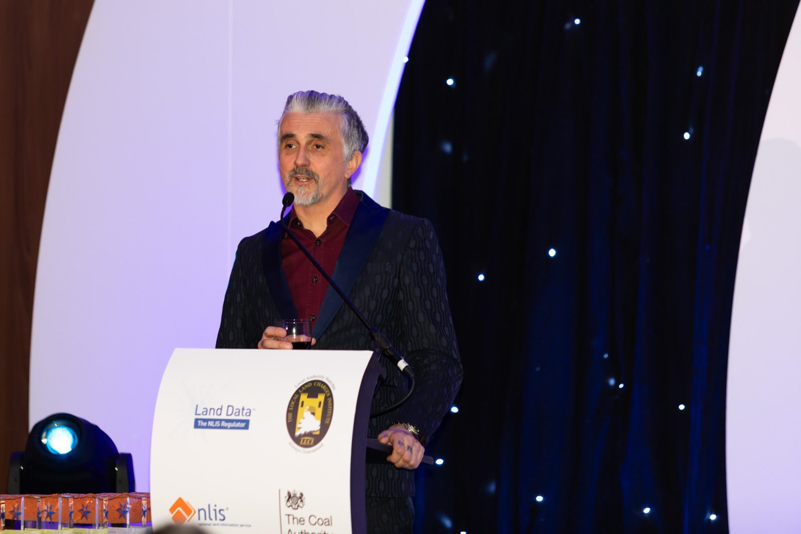 Awards ceremony host presenting at Midlands event