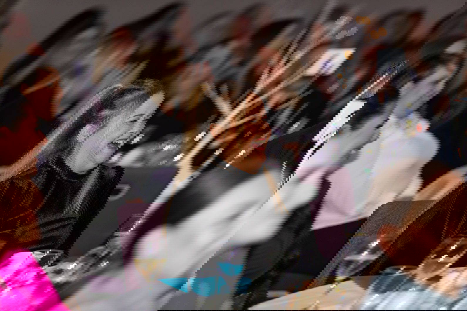 Guests laughing during awards night in the West Midlands