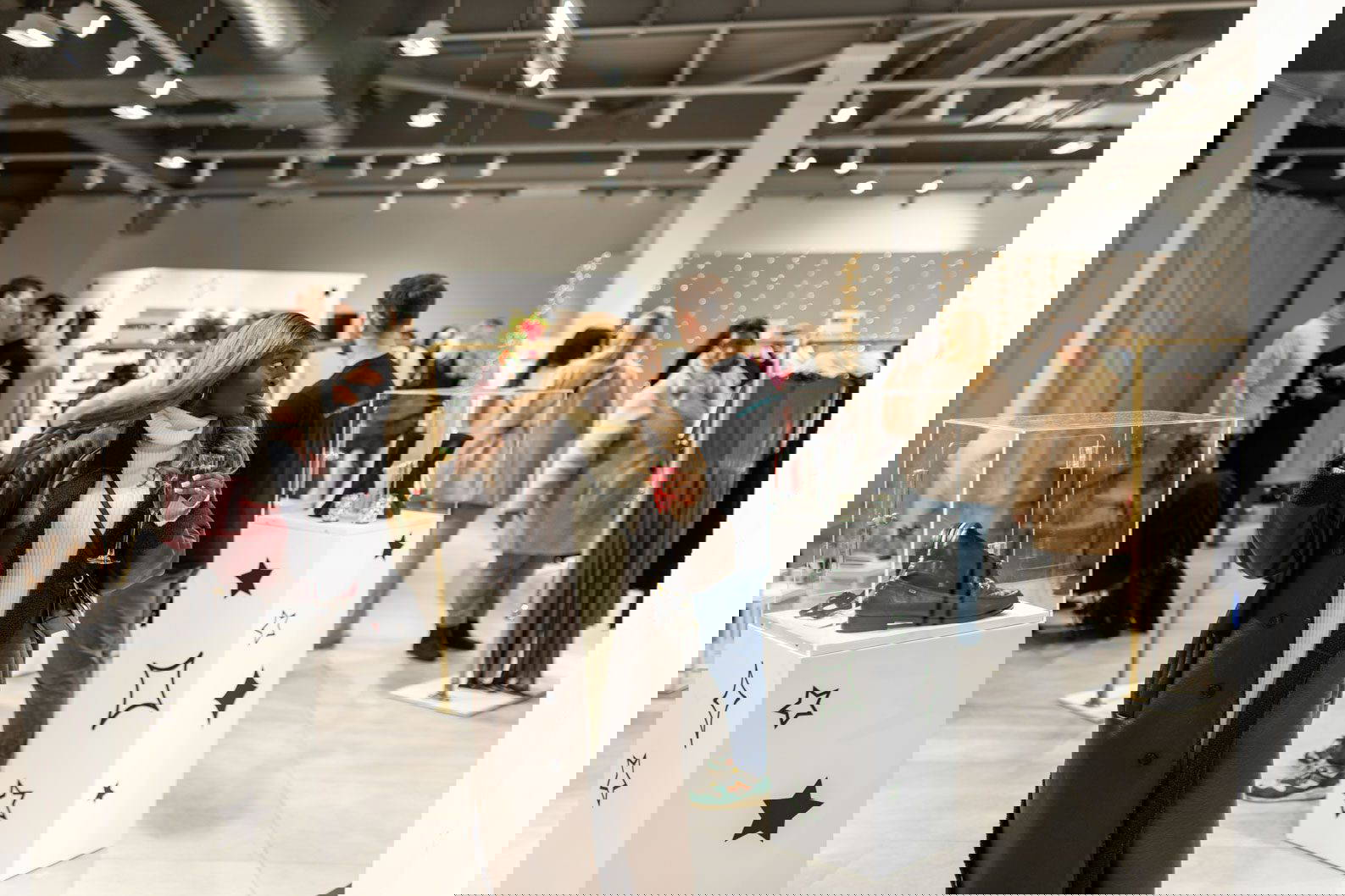 Guests enjoying a fashion-led brand activation with interactive installations