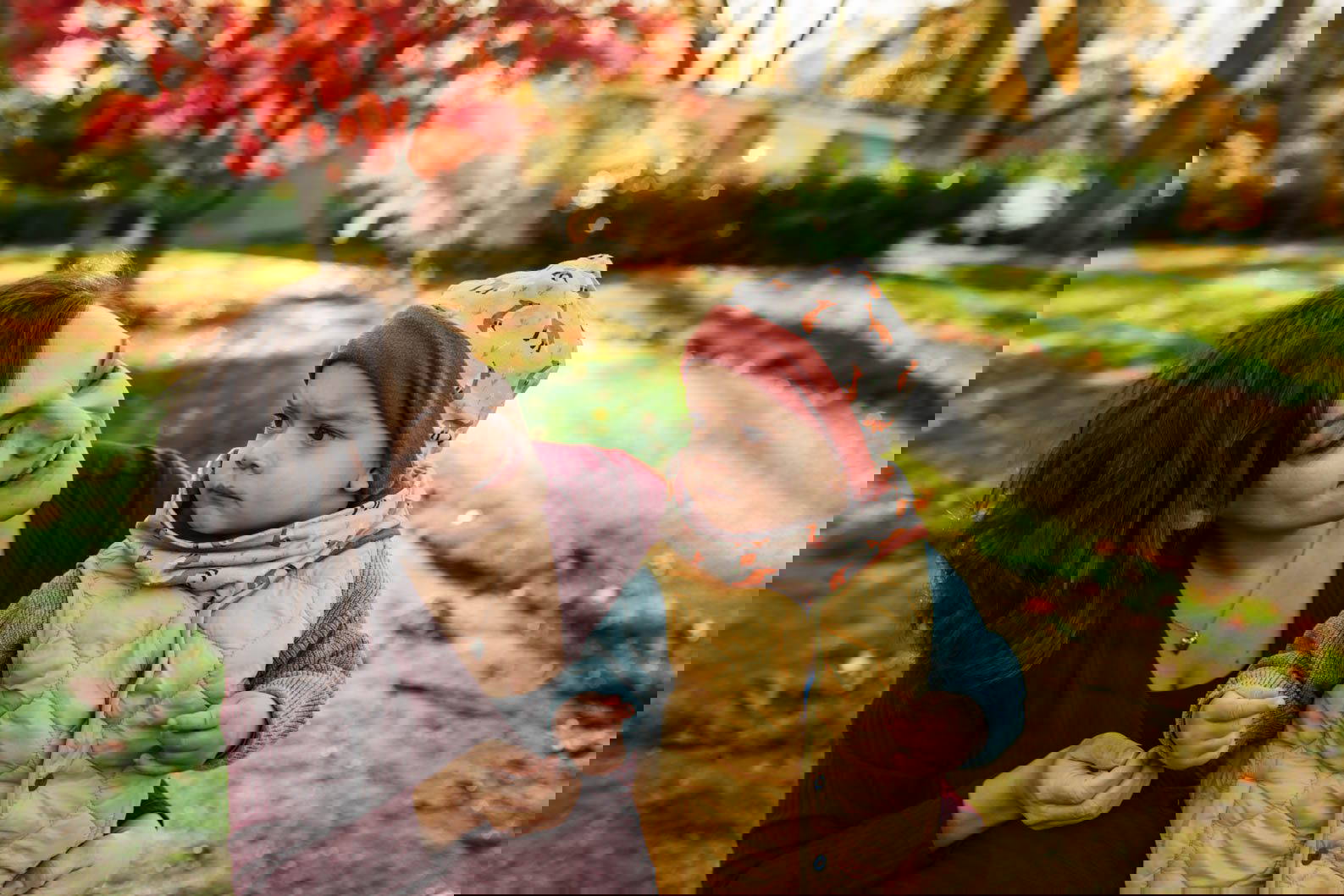 Mum smiling at son during a photoshoot in The West Midlands