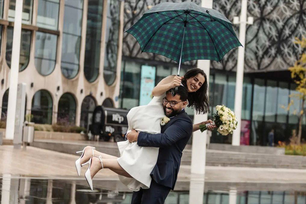Micro-package Relaxed couple laughing in Birmingham after Register Office ceremony during a short 2-hour Micro wedding photography session