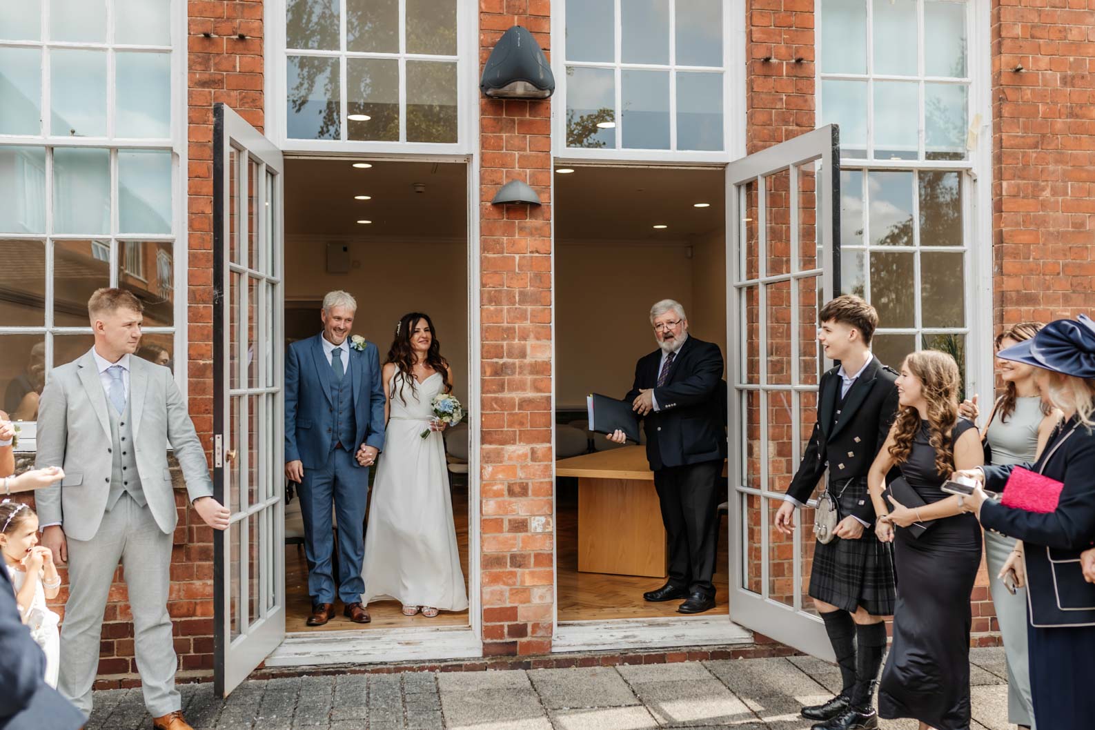Candid and joyful moments from a small registry office wedding in Bromsgrove.