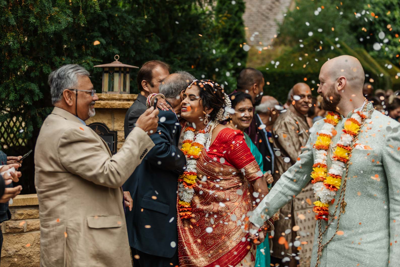 elaxed confetti photos outside wedding ceremony